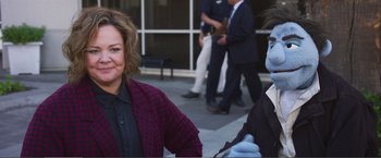 Movie still from “The Happytime Murders” (2018), directed by Brian Henson – A woman in a plaid shirt and a man in a black jacket; Medium shot, Over the shoulder angle