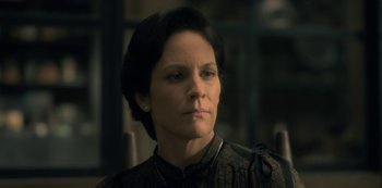 Movie still from “The Haunting of Hill House” (2018), directed by Mike Flanagan – A person wearing a dress; Close Up shot, Low angle