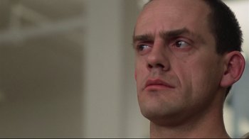 Movie still from “One Flew Over the Cuckoo's Nest” (1975), directed by Milos Forman – A person looking up at something; Close Up shot, Low angle