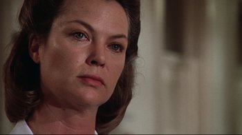 Movie still from “One Flew Over the Cuckoo's Nest” (1975), directed by Milos Forman – A woman's face as she stares into the distance; Close Up shot, Low angle