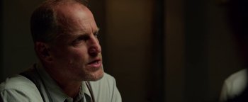 Movie still from “The Highwaymen” (2019), directed by John Lee Hancock – A person wearing a white shirt; Close Up shot, Over the shoulder angle