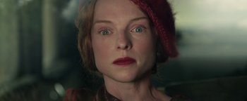 Movie still from “The Highwaymen” (2019), directed by John Lee Hancock – A person with green eyes wearing a hat; Close Up shot, Low angle