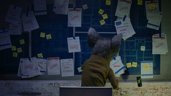 Movie still from “The House” (2022), directed by Paloma Baeza – A stuffed animal sitting in front of a window; Medium shot, Over the shoulder angle