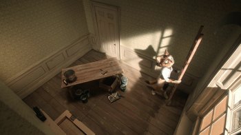 Movie still from “The House” (2022), directed by Paloma Baeza – A cat standing on a wooden floor in a room; Wide shot, High angle