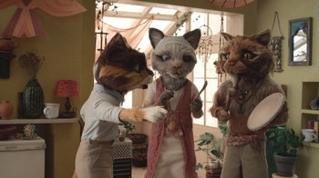 Movie still from “The House” (2022), directed by Paloma Baeza – A couple of cats dressed up in costumes; Medium shot, High angle