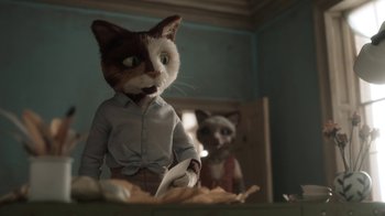 Movie still from “The House” (2022), directed by Paloma Baeza – A cat is wearing a shirt and a tie; Medium shot, Over the shoulder angle