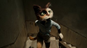 Movie still from “The House” (2022), directed by Paloma Baeza – A cat that is standing up on some stairs; Medium shot, High angle