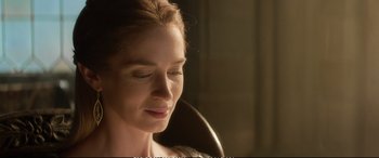 Movie still from “The Huntsman: Winter's War” (2016), directed by Cedric Nicolas-Troyan – A woman's face in a dark room; Close Up shot, Over the shoulder angle
