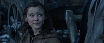 Movie still from “The Huntsman: Winter's War” (2016), directed by Cedric Nicolas-Troyan – A young girl with blue eyes looking up at the sky; Close Up shot, Over the shoulder angle