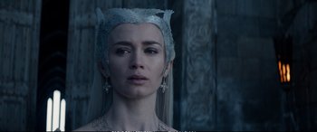 Movie still from “The Huntsman: Winter's War” (2016), directed by Cedric Nicolas-Troyan – A person wearing a crown; Close Up shot, Over the shoulder angle