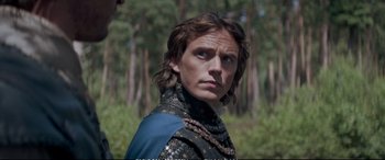 Movie still from “The Huntsman: Winter's War” (2016), directed by Cedric Nicolas-Troyan – A person wearing a costume; Close Up shot, Over the shoulder angle