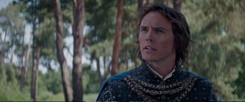 Movie still from “The Huntsman: Winter's War” (2016), directed by Cedric Nicolas-Troyan – A person wearing a costume; Close Up shot, Over the shoulder angle