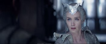 Movie still from “The Huntsman: Winter's War” (2016), directed by Cedric Nicolas-Troyan – A person wearing a costume; Close Up shot, Over the shoulder angle