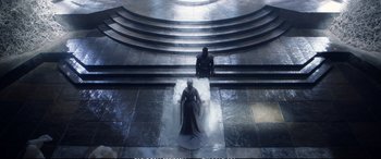 Movie still from “The Huntsman: Winter's War” (2016), directed by Cedric Nicolas-Troyan – A man sitting on the ground in front of another man; Wide shot, High angle