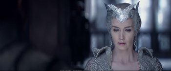 Movie still from “The Huntsman: Winter's War” (2016), directed by Cedric Nicolas-Troyan – A person wearing a costume; Close Up shot, Over the shoulder angle