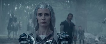 Movie still from “The Huntsman: Winter's War” (2016), directed by Cedric Nicolas-Troyan – A person wearing a costume; Close Up shot, Over the shoulder angle