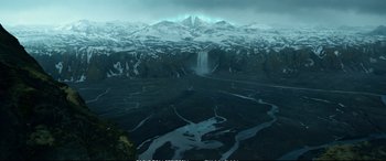 Movie still from “The Huntsman: Winter's War” (2016), directed by Cedric Nicolas-Troyan – A view of a mountain with a waterfall in the distance; Extreme Wide shot, High angle