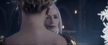 Movie still from “The Huntsman: Winter's War” (2016), directed by Cedric Nicolas-Troyan – Daenerys targaryen looking at herself in a mirror; Close Up shot, Over the shoulder angle