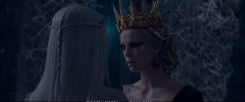 Movie still from “The Huntsman: Winter's War” (2016), directed by Cedric Nicolas-Troyan – A woman with a crown on her head; Close Up shot, Over the shoulder angle