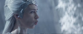 Movie still from “The Huntsman: Winter's War” (2016), directed by Cedric Nicolas-Troyan – A person wearing a silver head piece; Close Up shot, Low angle
