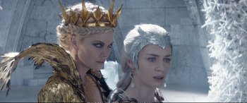 Movie still from “The Huntsman: Winter's War” (2016), directed by Cedric Nicolas-Troyan – Two women dressed up as a queen and a princess; Close Up shot, Over the shoulder angle