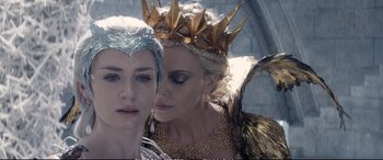 Movie still from “The Huntsman: Winter's War” (2016), directed by Cedric Nicolas-Troyan – Two women dressed up as snow white and the evil queen; Close Up shot, Over the shoulder angle