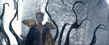 Movie still from “The Huntsman: Winter's War” (2016), directed by Cedric Nicolas-Troyan – Charlize theron as the evil queen in the movie snow white and the seven dwarfs; Medium shot, Low angle