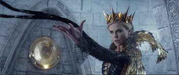 Movie still from “The Huntsman: Winter's War” (2016), directed by Cedric Nicolas-Troyan – Charlize theron as the evil queen in the hunchback of notre dame; Medium shot, Over the shoulder angle