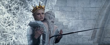 Movie still from “The Huntsman: Winter's War” (2016), directed by Cedric Nicolas-Troyan – Charlize theron as the ice queen in a scene from the movie snow white and the seven dwarfs; Close Up shot, Over the shoulder angle
