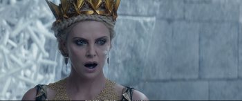 Movie still from “The Huntsman: Winter's War” (2016), directed by Cedric Nicolas-Troyan – Charlize theron wearing a crown; Close Up shot, Over the shoulder angle