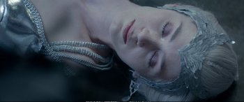 Movie still from “The Huntsman: Winter's War” (2016), directed by Cedric Nicolas-Troyan – A person laying on their stomach; Close Up shot, Overhead angle