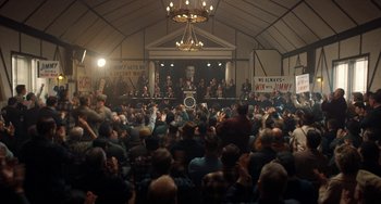 Movie still from “The Irishman” (2019), directed by Martin Scorsese – A crowd of people sitting in front of an audience; Extreme Wide shot, High angle