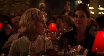 Movie still from “The Irishman” (2019), directed by Martin Scorsese – Two women are sitting at a table in a restaurant; Medium shot, Over the shoulder angle