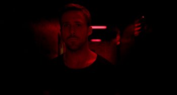 Movie still from “Only God Forgives” (2013), directed by Nicolas Winding Refn – A person in a dark room; Close Up shot, High angle