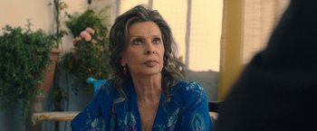 Movie still from “The Life Ahead” (2020), directed by Edoardo Ponti – An older woman is sitting in front of a window; Close Up shot, Over the shoulder angle