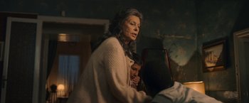Movie still from “The Life Ahead” (2020), directed by Edoardo Ponti – An older woman and a young boy in a room; Medium shot, Over the shoulder angle