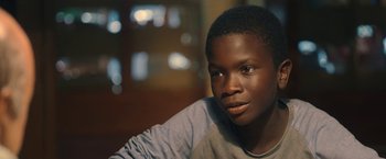 Movie still from “The Life Ahead” (2020), directed by Edoardo Ponti – A young person with a microphone; Close Up shot, Over the shoulder angle