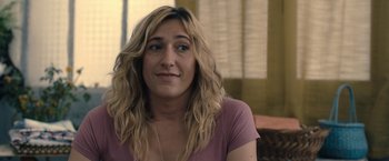 Movie still from “The Life Ahead” (2020), directed by Edoardo Ponti – A person sitting on a couch; Close Up shot, Over the shoulder angle