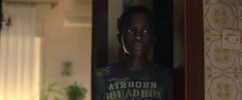 Movie still from “The Life Ahead” (2020), directed by Edoardo Ponti – A young boy is looking into the distance; Close Up shot, Low angle