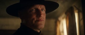 Movie still from “The Man from Toronto” (2022), directed by Patrick Hughes – A person wearing a hat; Close Up shot, Low angle