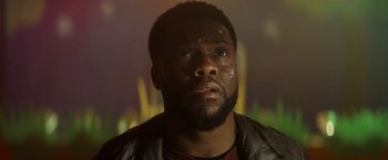 Movie still from “The Man from Toronto” (2022), directed by Patrick Hughes – A person with a beard; Close Up shot, Low angle