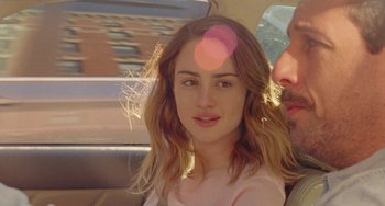 Movie still from “The Meyerowitz Stories” (2017), directed by Noah Baumbach – A woman sitting next to a man in a car; Close Up shot, Over the shoulder angle