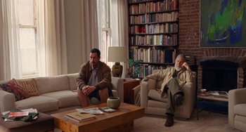 Movie still from “The Meyerowitz Stories” (2017), directed by Noah Baumbach – Two men sitting in a living room next to each other; Wide shot, Over the shoulder angle