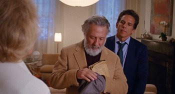 Movie still from “The Meyerowitz Stories” (2017), directed by Noah Baumbach – A man in a brown jacket and a man in a blue tie; Medium shot, Over the shoulder angle