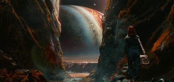Movie still from “The Midnight Sky” (2020), directed by George Clooney – An image of a painting of a space scene; Extreme Wide shot, Low angle