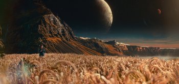 Movie still from “The Midnight Sky” (2020), directed by George Clooney – An image of an alien landscape with mountains in the background; Extreme Wide shot, High angle