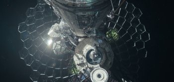 Movie still from “The Midnight Sky” (2020), directed by George Clooney – Looking down at a space station from the ground level; Extreme Wide shot, Overhead angle
