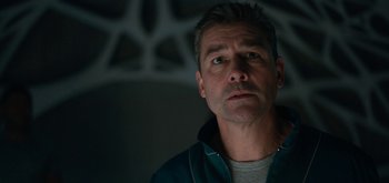 Movie still from “The Midnight Sky” (2020), directed by George Clooney – A person wearing a jacket; Close Up shot, Low angle