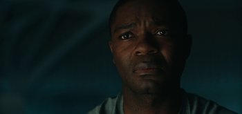 Movie still from “The Midnight Sky” (2020), directed by George Clooney – A person with his eyes wide open; Close Up shot, Low angle