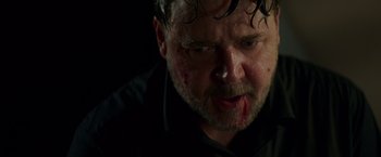 Movie still from “The Nice Guys” (2016), directed by Shane Black – A person with blood on his face; Close Up shot, Low angle